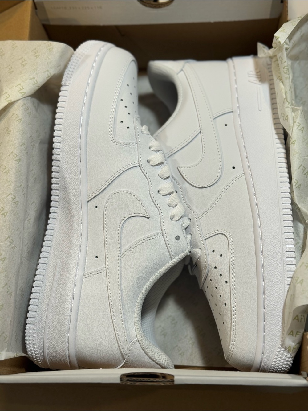 Nike Men’s All-White Low-Top Sneakers